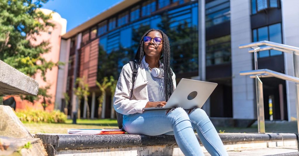 Student with Laptop